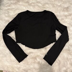 Black long sleeve crop top with ruffle trim